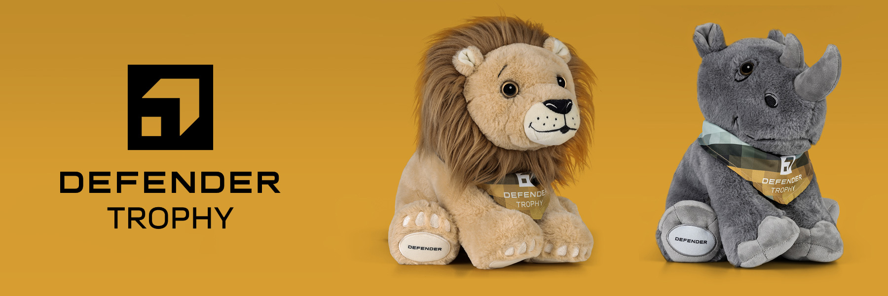 Defender x Tusk - Category Banner Defender Trophy hero banner featuring our Tusk lion and Rhino plush teddy bears.